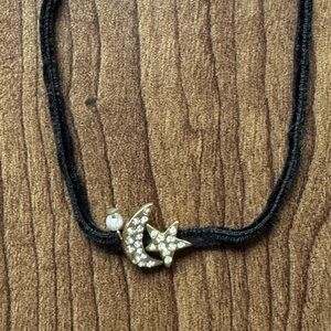 Zara velvet choker with a moon and a star pendants